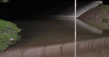 Reflections Of A Pole And Concrete Structure On The Stagnant Flood Water In Leiria, Portugal - Midshot video