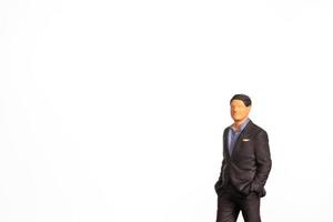 Miniature Businessman on white background And space for text photo