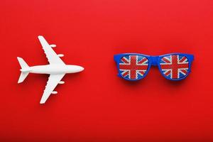 Sunglasses on a Wooden Tabel Reflecting the Union Jack photo