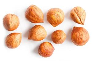 Top view of shelled hazelnuts isolated on white photo