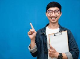 Business man wear glasses jeans shirt hold document board gesture point finger