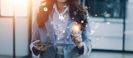 businessmen Fingerprint scanning and biometric authentication, processing of biometric for access personal data. surveillance and security scanning of digital programs cyber futuristic applications photo