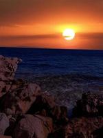 Scenic view of ocean view and mountains at sunset in Sinai, Egypt photo