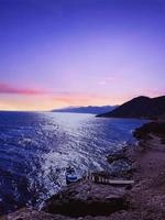 Scenic view of ocean view and mountains at sunset in Sinai, Egypt photo