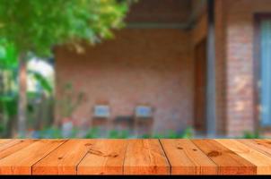 perspective wooden board over blurred wall photo