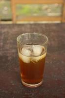 sweet fresh iced tea with blur background. photo