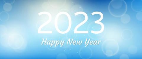 Happy new year 2023 incription on blurred background. White numbers on backdrop with confetti, bokeh and lens flare. Vector illustration