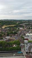 Aerial Footage of Train Tracks Passing Through Luton Town of England. Vertical and Portrait Style Video Clip Was Captured with Drone's Camera