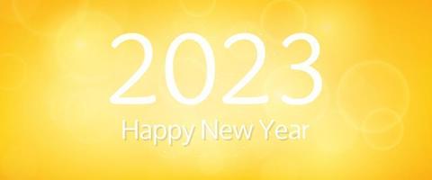 Happy new year 2023 incription on blurred background. White numbers on backdrop with confetti, bokeh and lens flare. Vector illustration