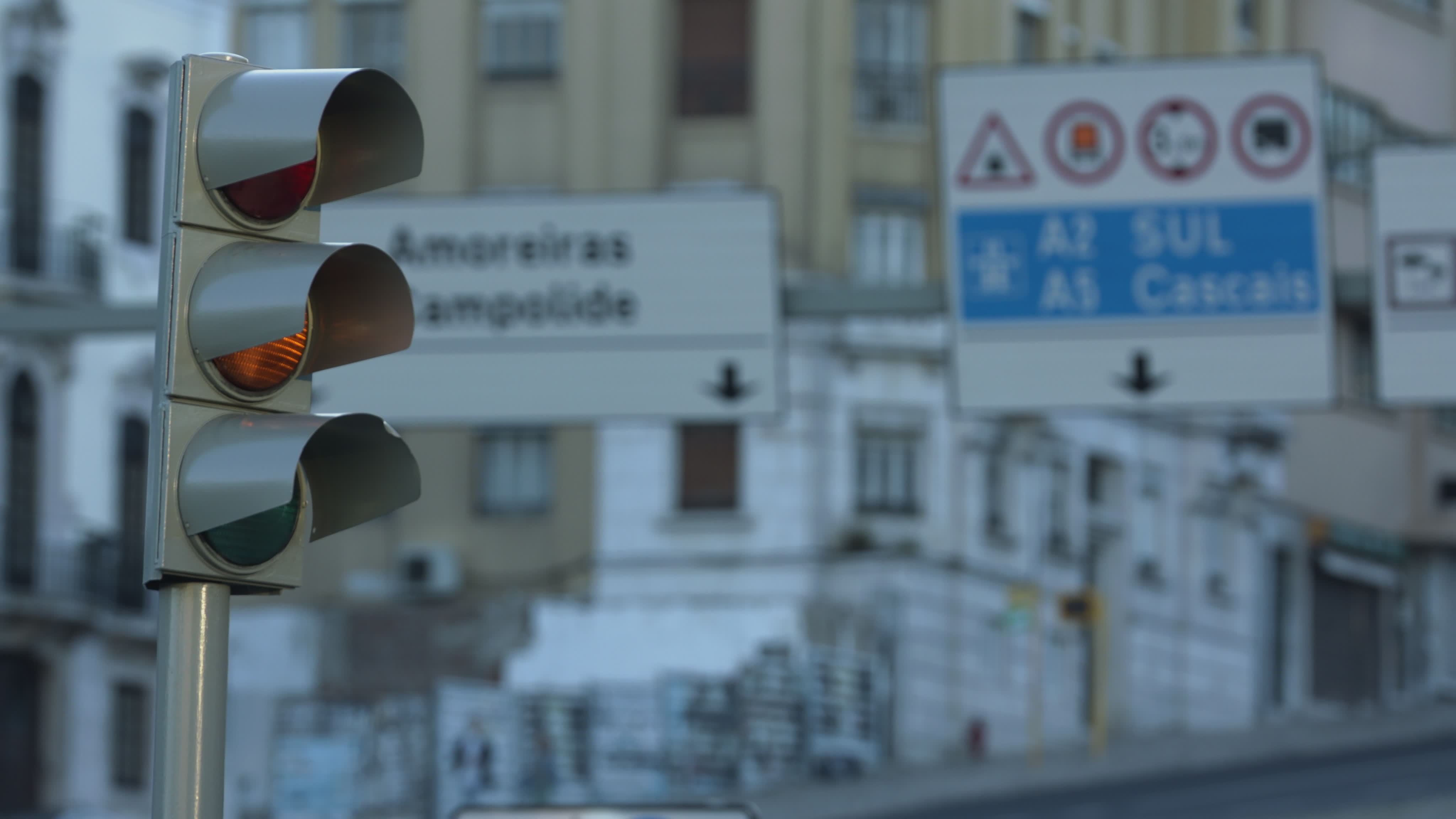 Green, Red, And Yellow Traffic Lights Changing At The Marques De Pombal