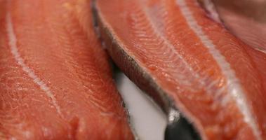 Fresh Salmon Meat Prepared For Sushi In A Japanese Restaurant Kitchen - macro video