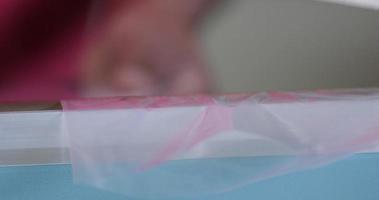 Hot Cutting Machine Used In Cutting Plastic Bags In A Factory - Closeup Shot