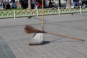 Broom,  household, cleaning services,  concept. photo