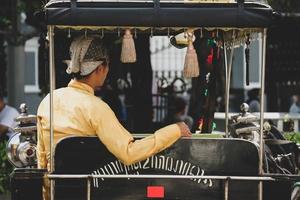 Yogyakarta, Indonesia on October 2022. Rear view of a wagon or Andong driver on Jalan Malioboro, Yogyakarta. photo