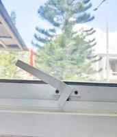 Photo of an aluminum window handle which has the function of opening and closing the window