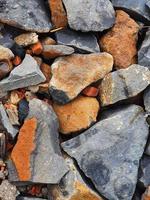 Broken rocks photographed at close range so that all the photo frames are filled with them. It is suitable for backgrounds