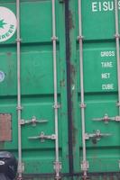 Back view of the container in green. photo