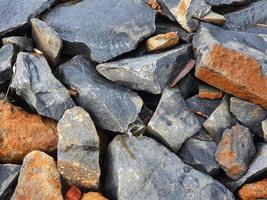 Broken rocks photographed at close range so that all the photo frames are filled with them. It is suitable for backgrounds