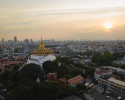 An aerial view of the Golden Mount stands prominently at Saket Temple, The most famous tourist attraction in Bangkok, Thailand photo