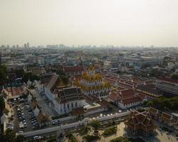 An aerial view of the Metal Castle or Loha Prasat in Ratchanatdaram Temple, The most famous tourist attraction in Bangkok, Thailand photo