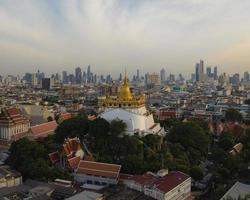 An aerial view of the Golden Mount stands prominently at Saket Temple, The most famous tourist attraction in Bangkok, Thailand photo