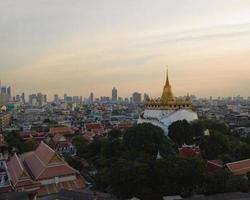 An aerial view of the Golden Mount stands prominently at Saket Temple, The most famous tourist attraction in Bangkok, Thailand photo