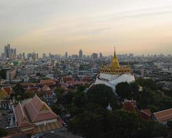 An aerial view of the Golden Mount stands prominently at Saket Temple, The most famous tourist attraction in Bangkok, Thailand photo