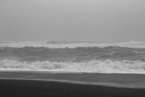Rolling waves and storm monochrome landscape photo
