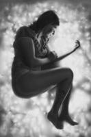 Attractive lady and fairy lights monochrome scenic photography photo