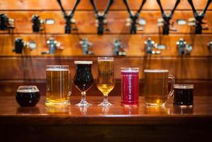 Different varieties of pees are on the bar in the pub photo