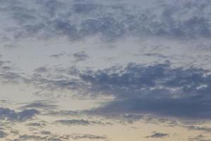 Dramatic colorful sky with afterglow and illuminated clouds photo