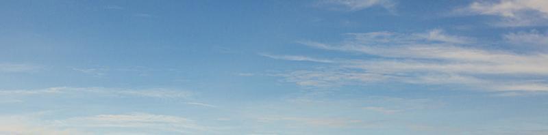 Image of a partly cloudy and partly clear sky during the day photo