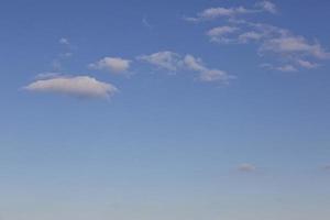 Image of a partly cloudy and partly clear sky during the day photo