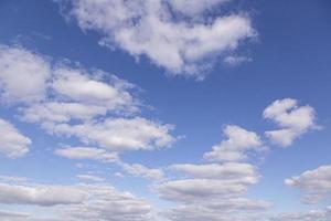 Image of a partly cloudy and partly clear sky during the day photo