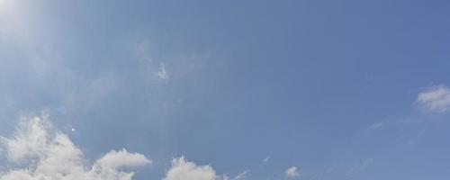 Image of a partly cloudy and partly clear sky during the day photo