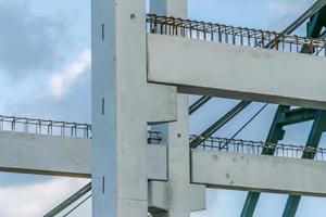 Precast concrete elements during installation on construction site photo