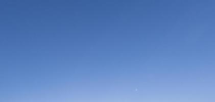 Image of a clear and cloudless sky can be used as background photo