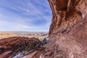 Panoramic picture of natural and geological wonders of Arches national park in Utah in winter photo