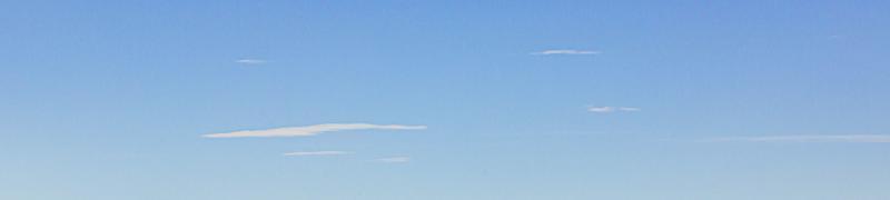 Image of a partly cloudy and partly clear sky during the day photo