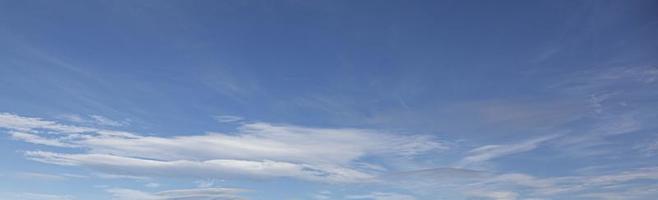 Image of a partly cloudy and partly clear sky during the day photo