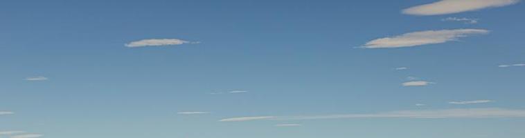 Image of a partly cloudy and partly clear sky during the day photo