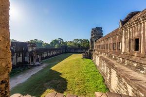 Mystical and famous ruins of Anchor Wat in Cambodia with no people in summer photo