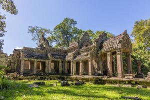 Mystical and famous ruins of Anchor Wat in Cambodia with no people in summer photo