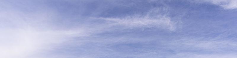 Image of a partly cloudy and partly clear sky during the day photo