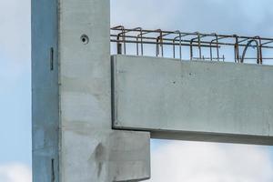 Precast concrete elements during installation on construction site photo