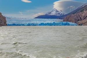 Panoramic view over Lago Grey and the edge of the Grey Glacier in Torres del Paine National Park in Patagonia photo