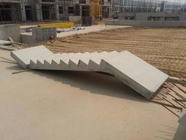 Straight precast concrete staircase with attached landing photo