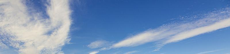 Image of a partly cloudy and partly clear sky during the day photo