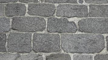 Detail of a stone wall with different size of rocks. video