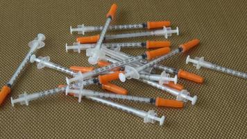 Insulin syringes for diabetes. Medical syringe. Many syringes video